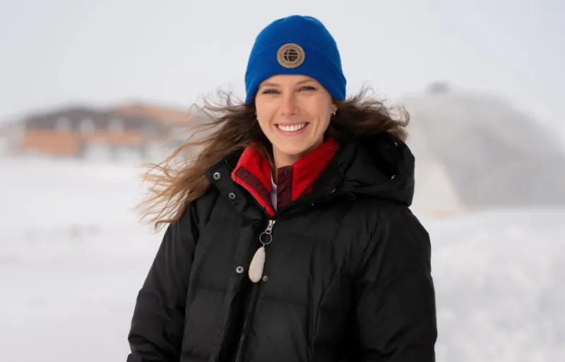 Anne-Michelle Engelstad posing in a snowy Arctic setting.