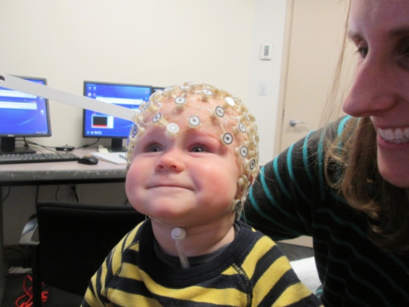 Susan Faja and her son having fun with EEG.