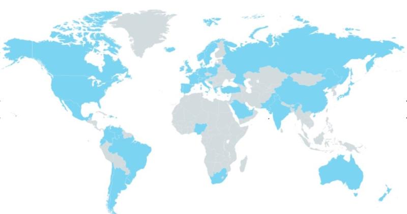 Light blue and grey flat map of the world with the ocean areas appearing in white.
