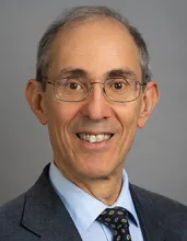 Dennis Poe, MD, PhD